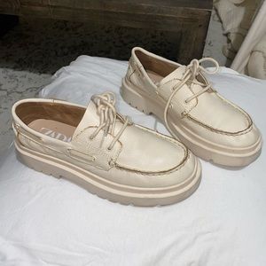 Cream colored leather boat shoe